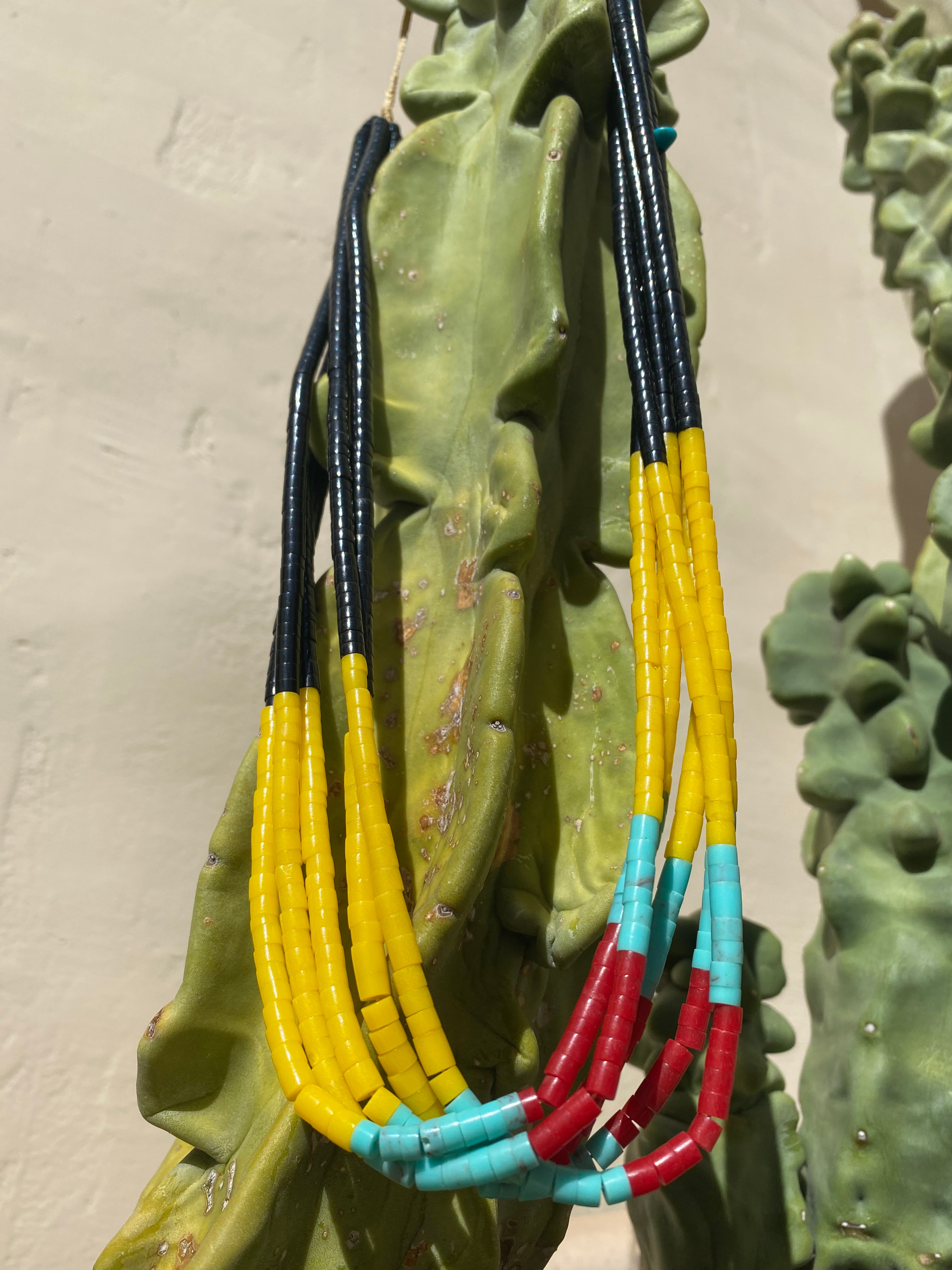 Black Jet, Yellow Serpentine, Turquoise and Coral Necklace