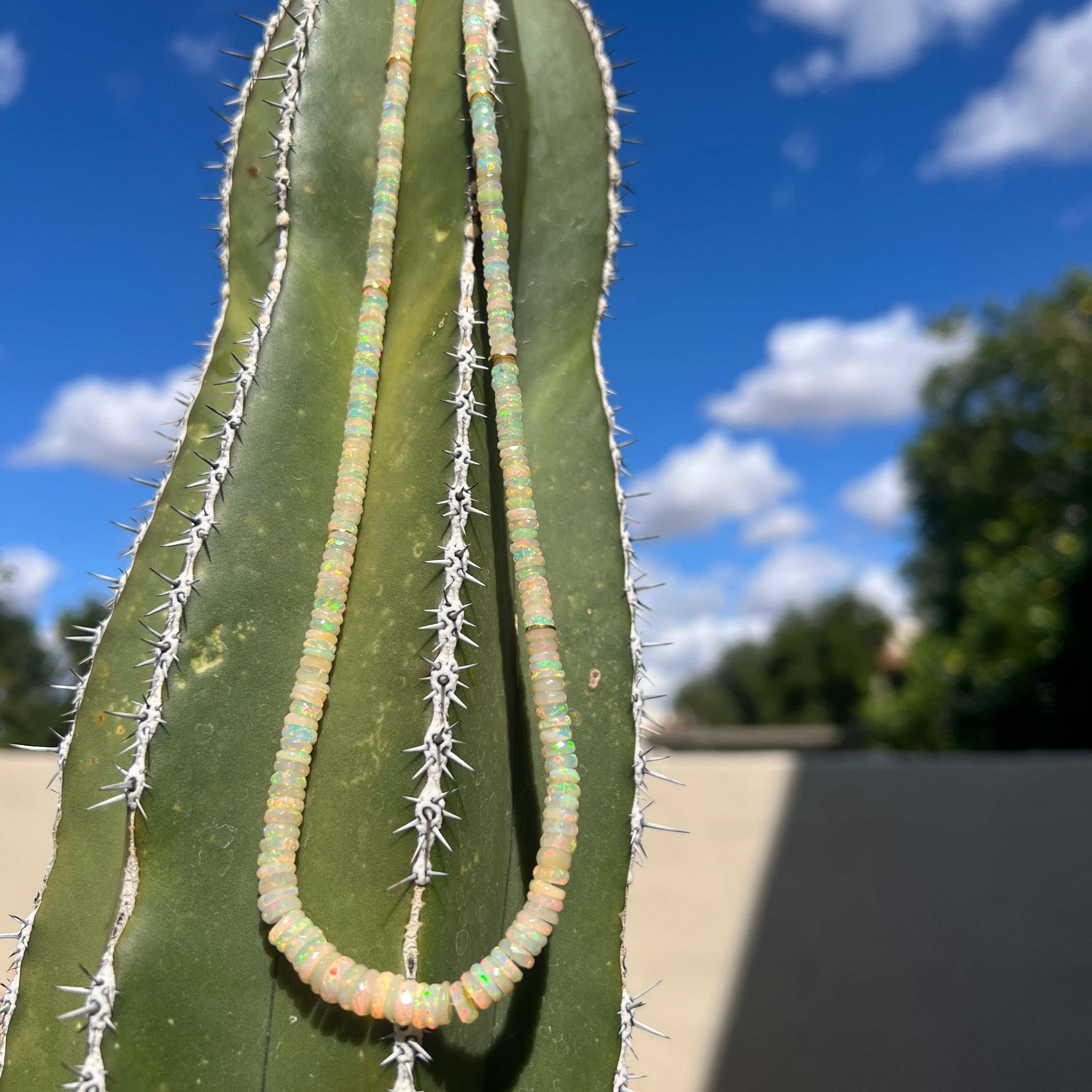 Ethiopian Opal and 18 Kt Gold Faceted Necklace